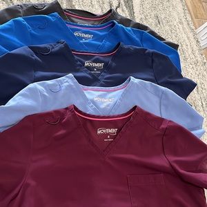 5 pairs of Butter-soft Movement scrubs size medium top and medium pants.